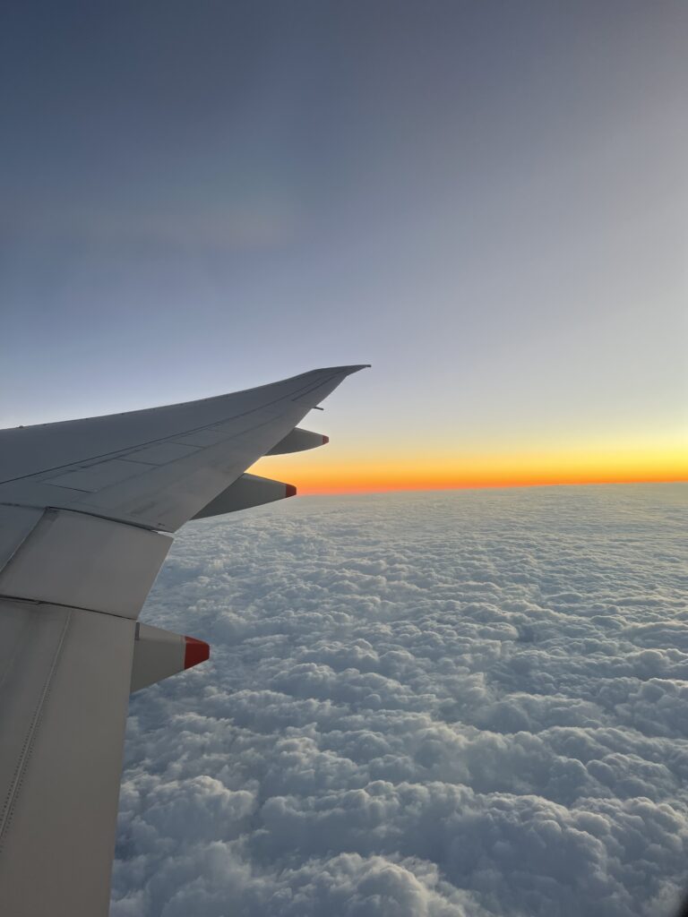 Plane and clouds travelling from SG to London